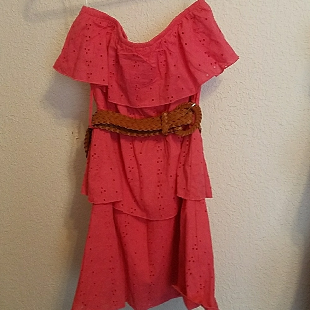 Pink halter dress with woven brown belt.